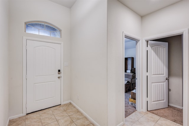 entrance foyer with light tile patterned floors