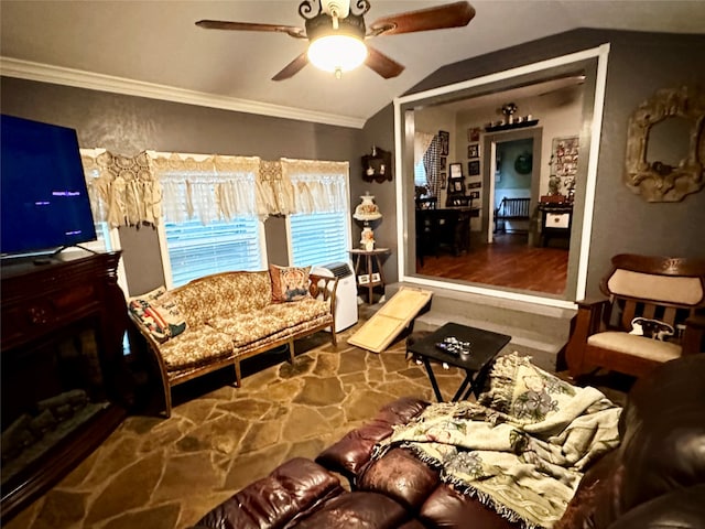 living room featuring crown molding, vaulted ceiling, ceiling fan, and wood-type flooring