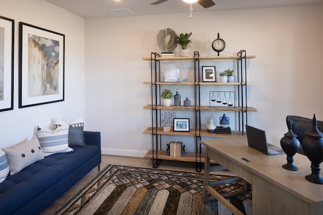 office featuring hardwood / wood-style flooring and ceiling fan