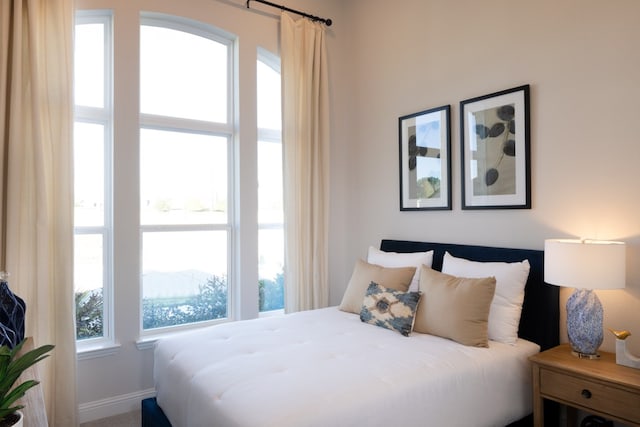 bedroom featuring a mountain view