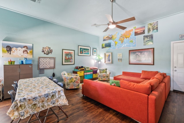 living room with ceiling fan, dark hardwood / wood-style floors, and ornamental molding