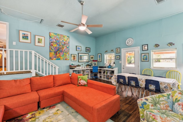 living room with hardwood / wood-style flooring and ceiling fan