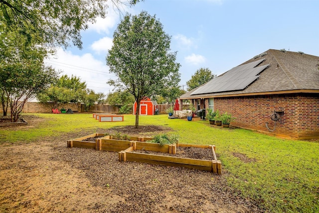 view of yard featuring a storage unit