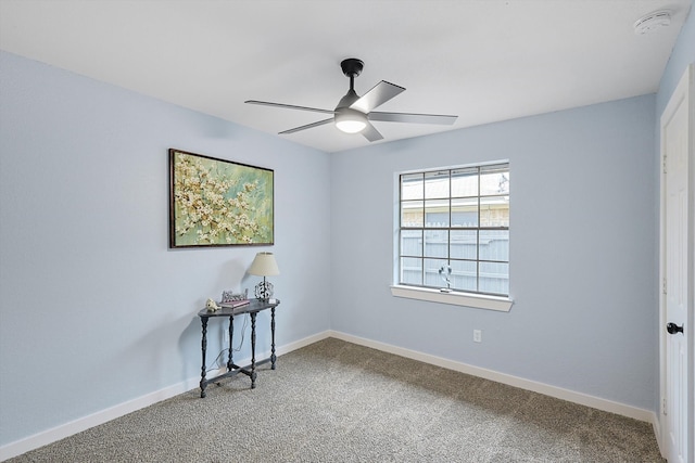 unfurnished room featuring carpet flooring and ceiling fan