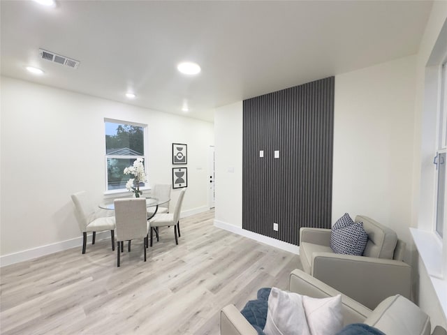 dining room with light hardwood / wood-style flooring