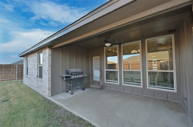 view of patio featuring ceiling fan and grilling area