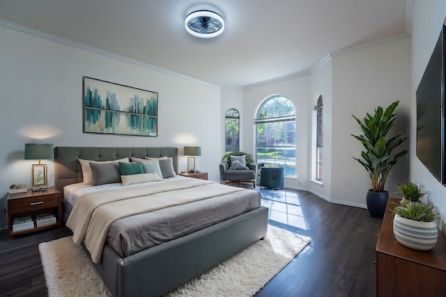 bedroom featuring dark hardwood / wood-style flooring and crown molding