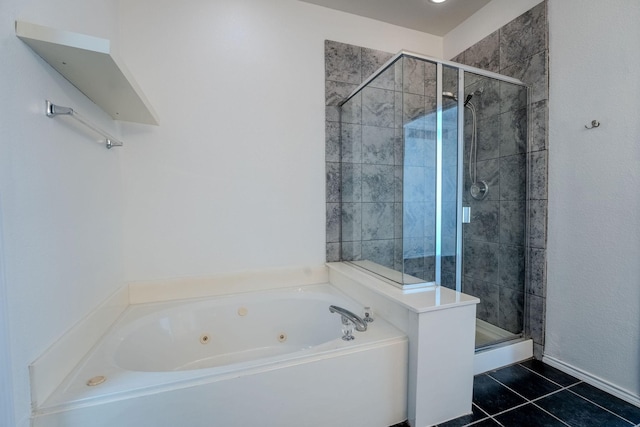 bathroom featuring tile patterned floors and independent shower and bath