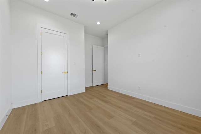 unfurnished bedroom with light hardwood / wood-style floors