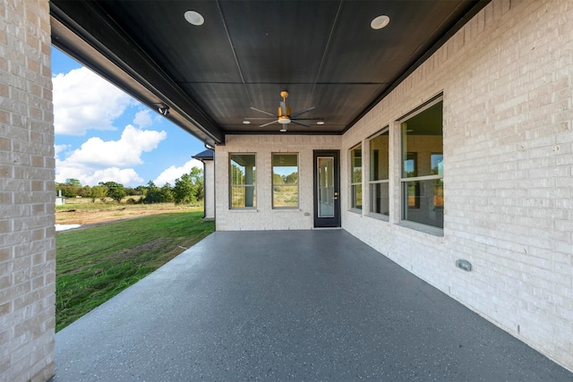 view of patio / terrace featuring ceiling fan