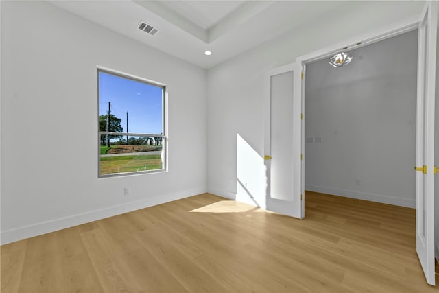 empty room with light wood-type flooring