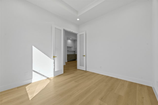 unfurnished room featuring light hardwood / wood-style flooring