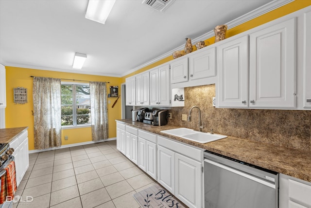 kitchen with backsplash, ornamental molding, stainless steel appliances, sink, and white cabinets