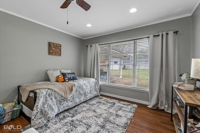 bedroom with crown molding, ceiling fan, and dark wood-type flooring