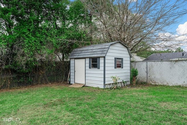 view of outdoor structure featuring a yard