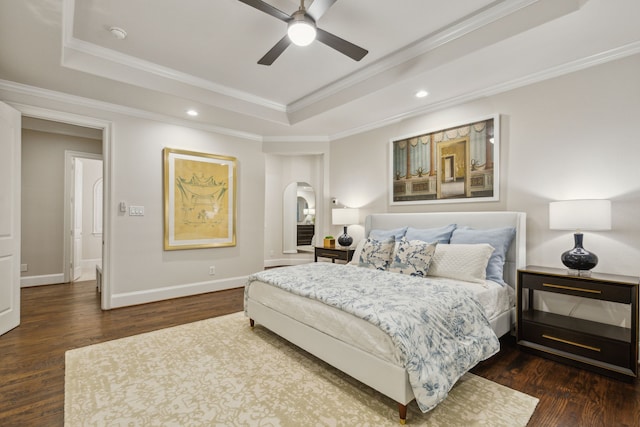 549 Round Hollow Ln, Southlake, TX 76092 - bedroom with a tray ceiling, arched walkways, wood finished floors, ornamental molding, and recessed lighting
