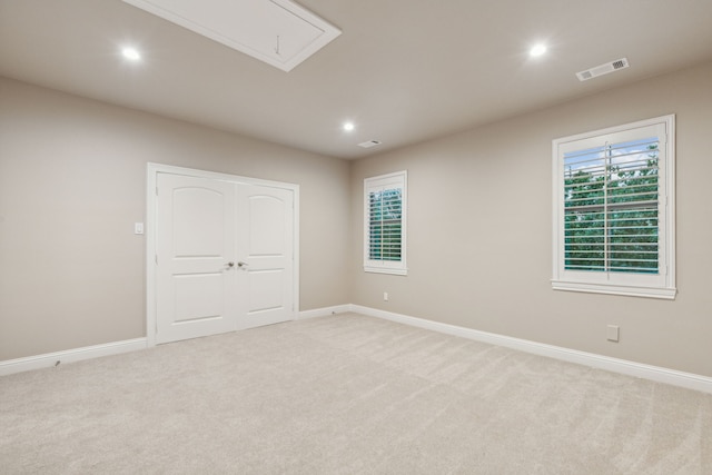 549 Round Hollow Ln, Southlake, TX 76092 - unfurnished bedroom featuring attic access, light carpet, recessed lighting, and a closet