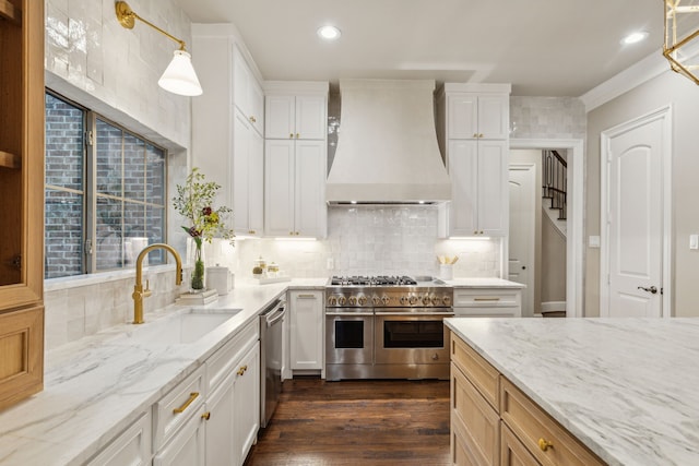 549 Round Hollow Ln, Southlake, TX 76092 - kitchen featuring appliances with stainless steel finishes, custom exhaust hood, recessed lighting, dark wood finished floors, and backsplash
