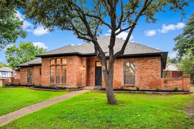 view of front of home with a front lawn