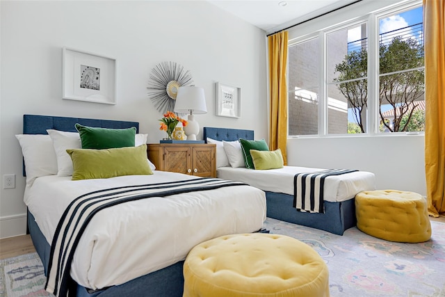 bedroom featuring wood finished floors