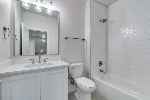 9813 Aiken Ct, Mesquite, TX 75126 - full bath featuring toilet, vanity, and bathing tub / shower combination