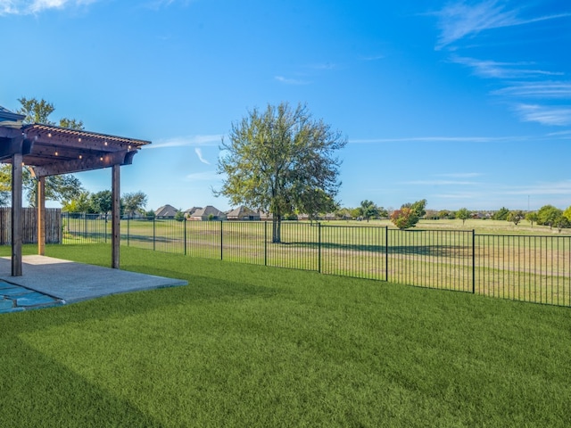 view of yard with a patio and a pergola