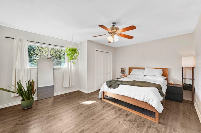 1246 Woodburn Trl, Dallas, TX 75241 - bedroom featuring wood finished floors, baseboards, a closet, and ceiling fan