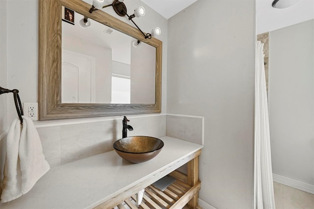 1246 Woodburn Trl, Dallas, TX 75241 - bathroom featuring baseboards and vanity