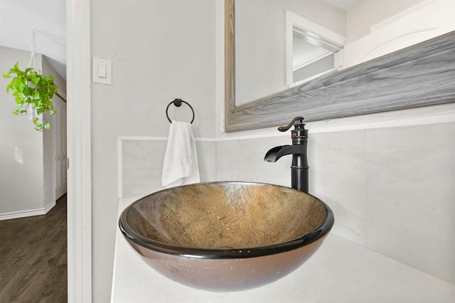 1246 Woodburn Trl, Dallas, TX 75241 - bathroom view of a sink and wood finished floors