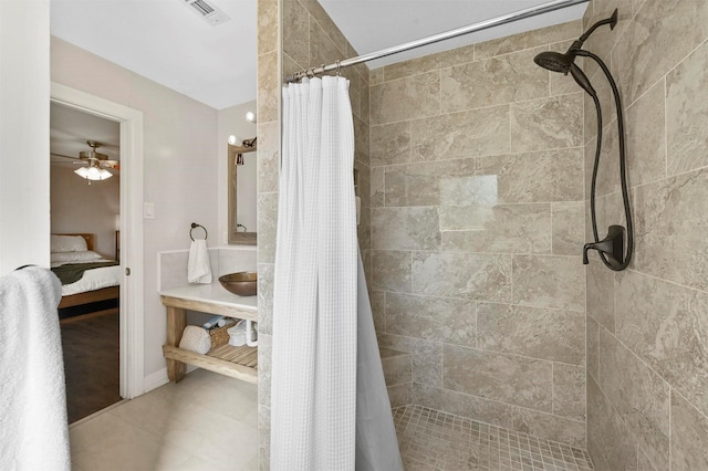 1246 Woodburn Trl, Dallas, TX 75241 - bathroom featuring ensuite bathroom, tiled shower, and a ceiling fan
