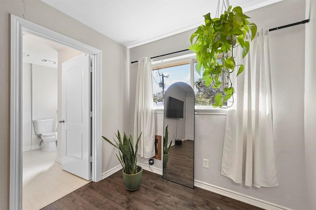 1246 Woodburn Trl, Dallas, TX 75241 - hall featuring baseboards and wood finished floors