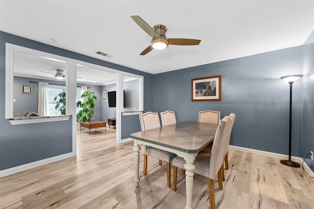 1246 Woodburn Trl, Dallas, TX 75241 - dining space with a ceiling fan, light wood-style flooring, and baseboards