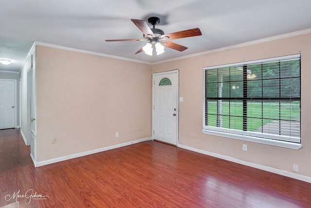 interior space with wood-type flooring, ceiling fan, and crown molding