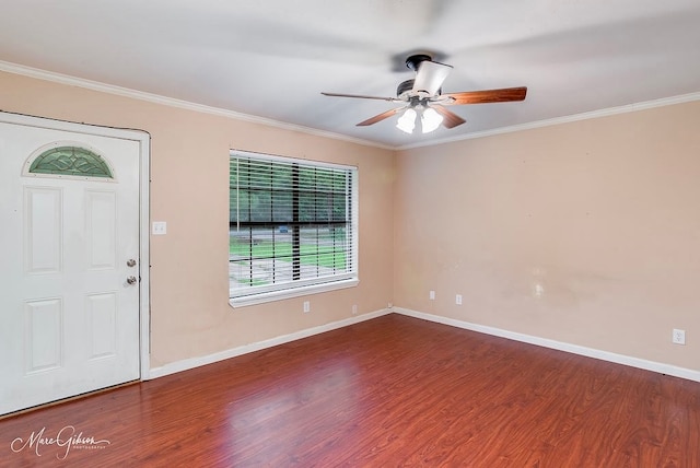 entryway with hardwood / wood-style flooring, ceiling fan, and crown molding