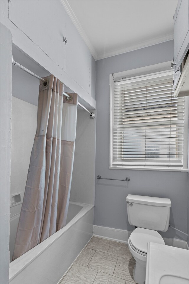 bathroom featuring toilet, shower / bath combination with curtain, and crown molding