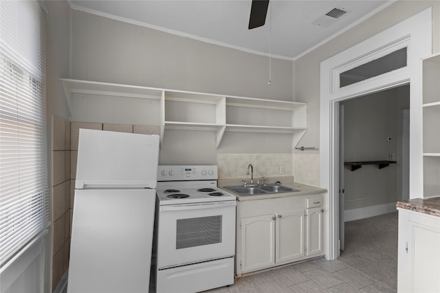 kitchen featuring sink, ornamental molding, ceiling fan, white cabinetry, and white appliances