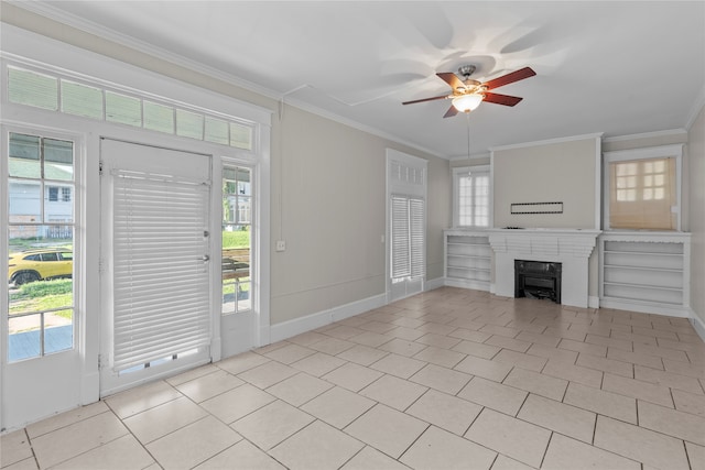 unfurnished living room with ceiling fan, light tile patterned floors, and a healthy amount of sunlight