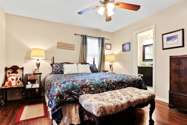 bedroom featuring ensuite bath, dark wood-type flooring, multiple windows, and ceiling fan