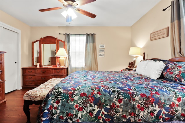 bedroom featuring dark hardwood / wood-style flooring and ceiling fan