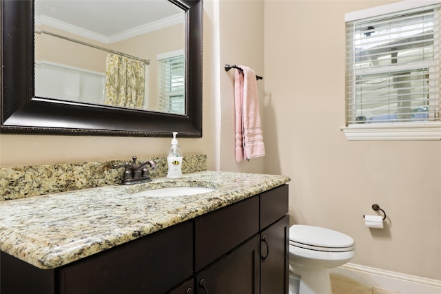 bathroom with toilet, curtained shower, vanity, and crown molding