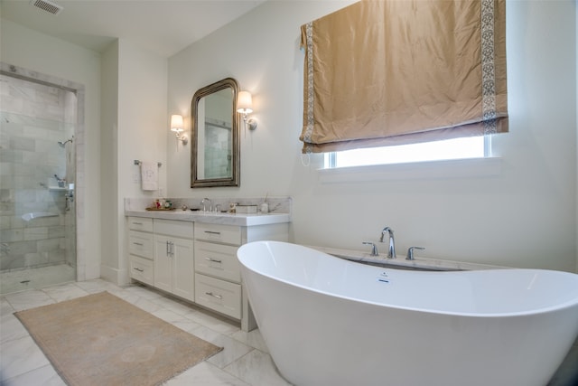 bathroom featuring plus walk in shower and vanity