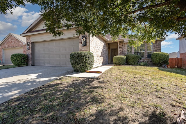 view of front facade with a front lawn and a garage