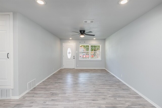 bathroom featuring hardwood / wood-style floors and ceiling fan