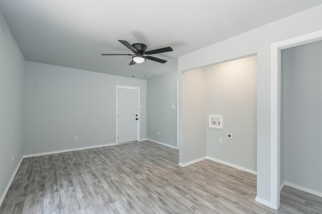 unfurnished bedroom featuring light hardwood / wood-style flooring, ceiling fan, and a closet