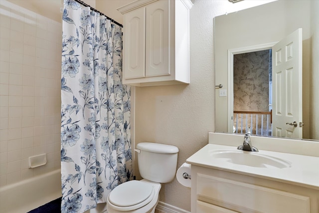 full bathroom featuring shower / bath combo, vanity, and toilet