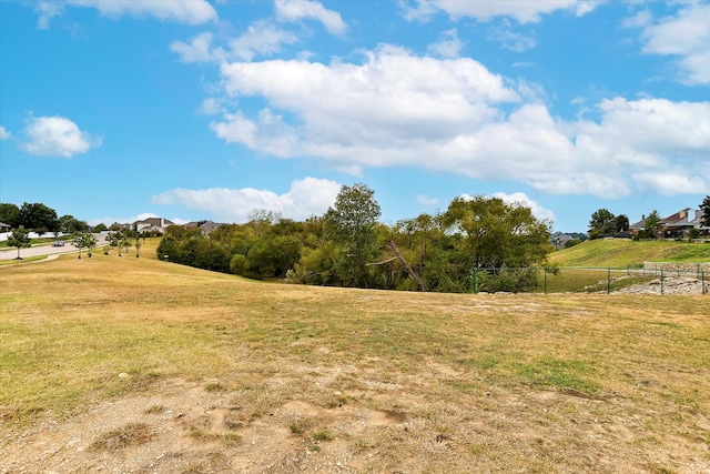 view of yard with a rural view