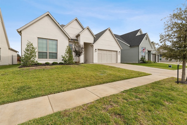 view of front of house with a front yard and a garage