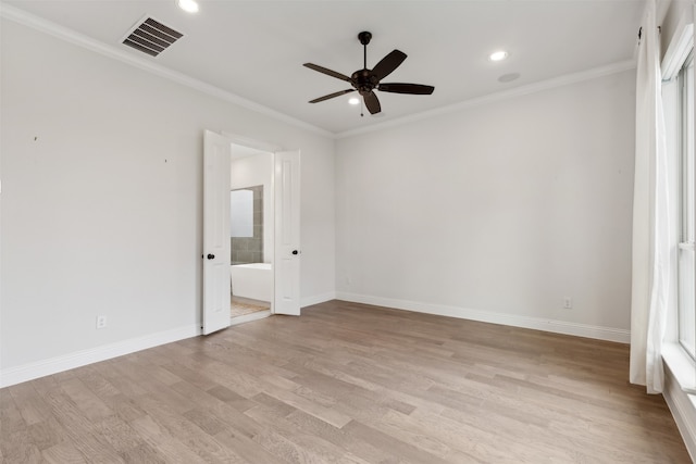 unfurnished bedroom with light hardwood / wood-style flooring, ceiling fan, crown molding, and connected bathroom