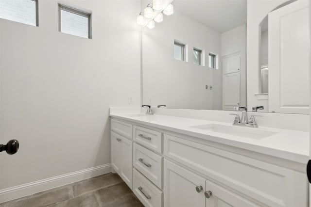 bathroom with vanity and tile patterned flooring