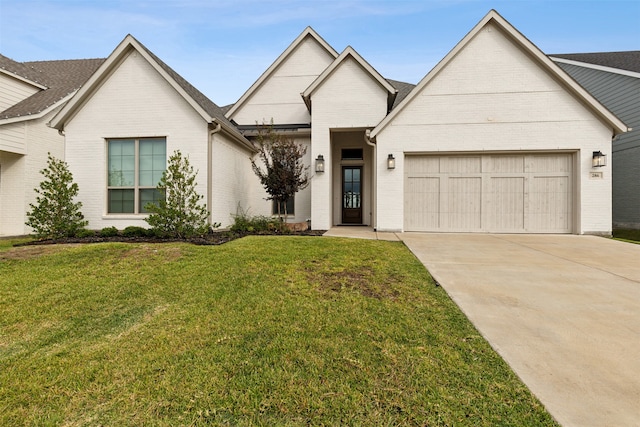 view of front facade with a front lawn and a garage